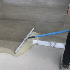 Xymertec DPC & concrete primer application with squeegee